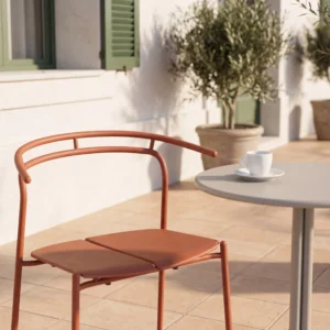 Matte Terracotta Carbon Steel Split Seat Curved Back Stackable Outdoor Dining Armchair